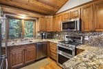Mammoth Condo Rental Meadow Ridge 24: Remodeled kitchen with granite counters and stainless steel appliances
